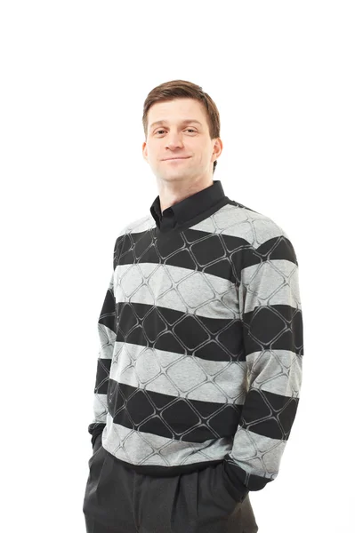 Aantrekkelijke jonge man in de trui op wit — Stockfoto