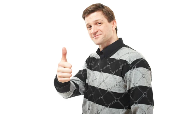 Attraktiver junger Mann im Pullover zeigt Daumen hoch — Stockfoto