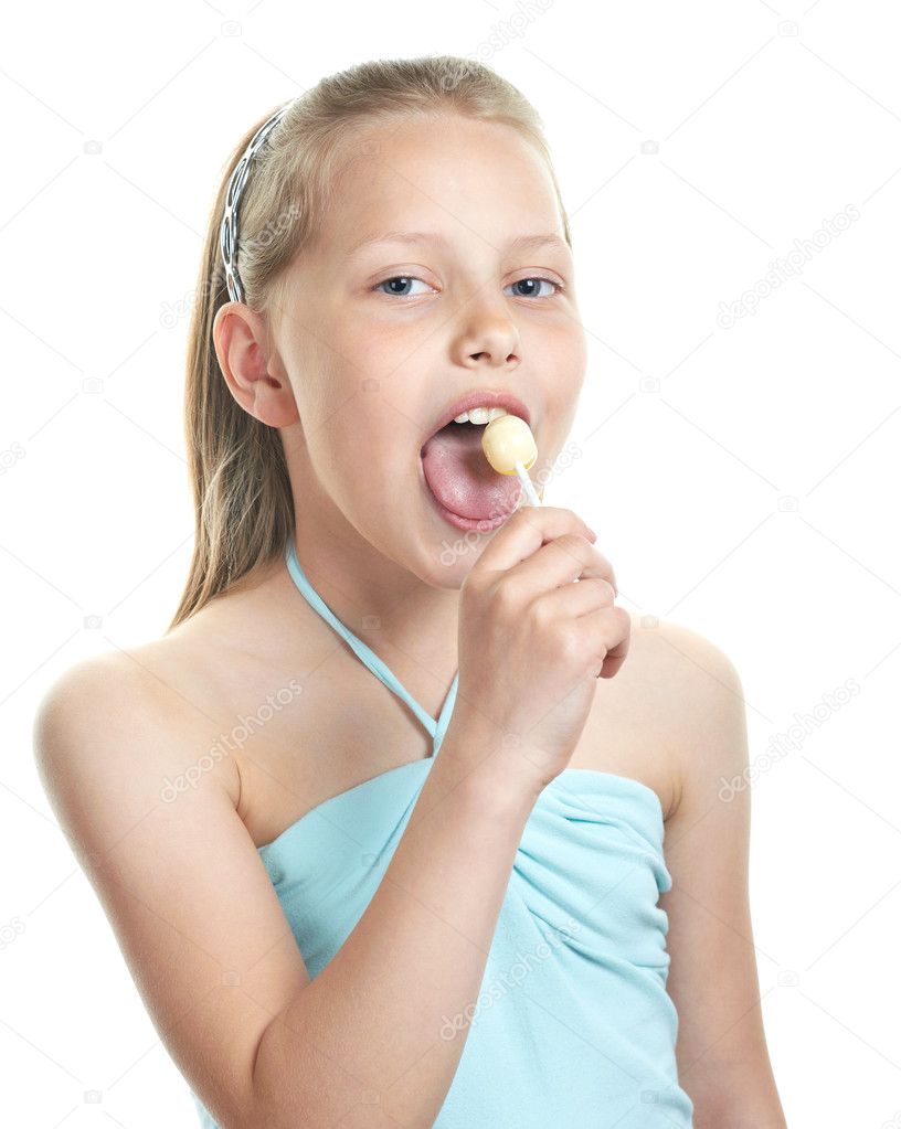 Cheerful little girl with lollipop