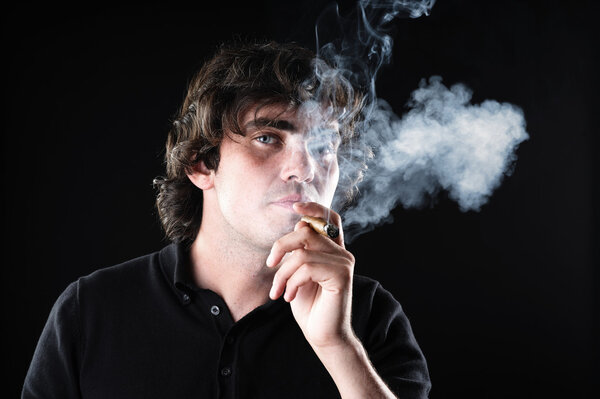 Closeup portrait of a man with cigar