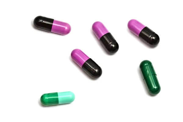 Renkli ilaçlar üzerinde beyaz izole — Stok fotoğraf