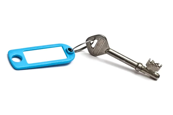 Blank tag and old key — Stock Photo, Image