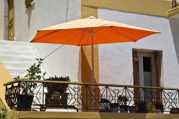 Umbrellas and balcony — Stock Photo, Image