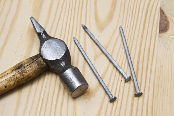 Old hammer and nails — Stock Photo, Image