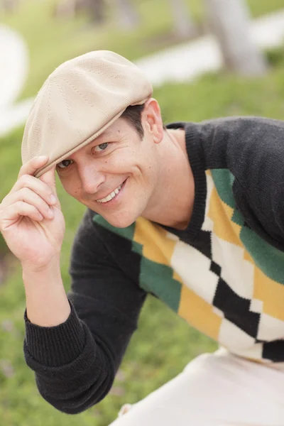 Handsome man tipping his hat — Stock Photo, Image