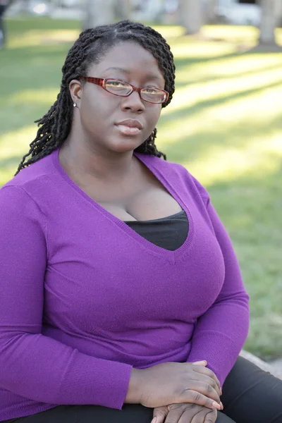 Young plus size model in the park — Stock Photo, Image
