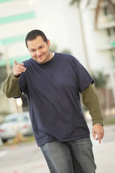 Man pointing at his friends — Stock Photo, Image