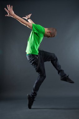 Hip-hop style dancer posing clipart