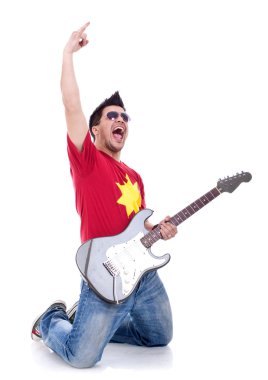 Attractive musician playing guitar clipart