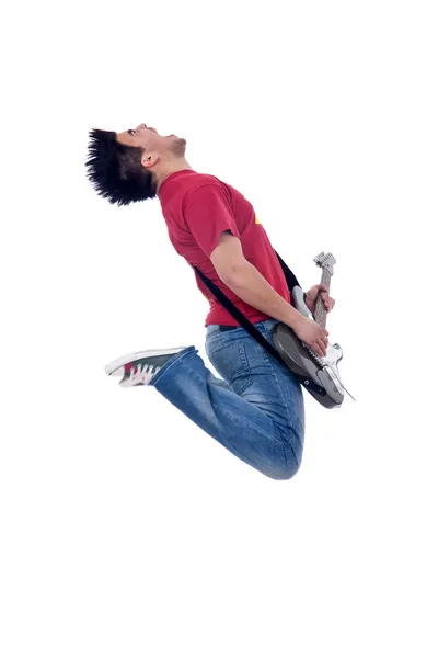 Leidenschaftlicher Gitarrist springt — Stockfoto