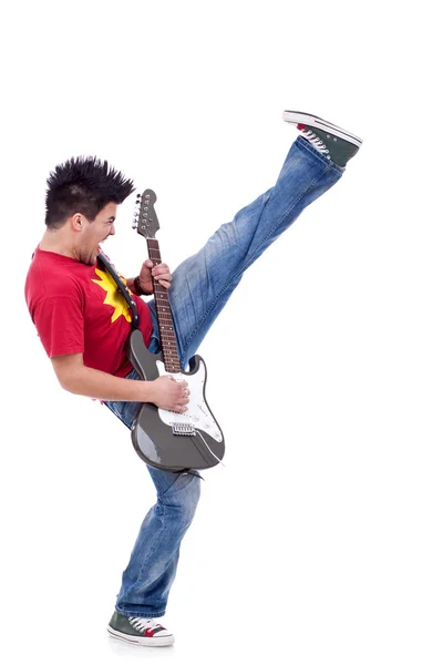Sparka gitarristen spelar — Stockfoto