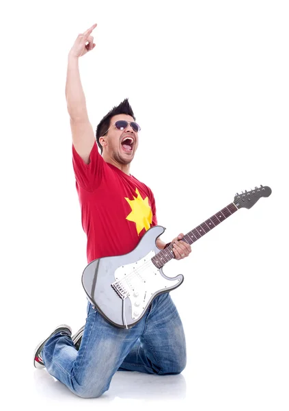 Attractive musician playing guitar — Stock Photo, Image
