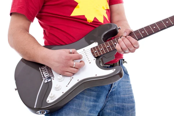 Músico tocando uma guitarra elétrica — Fotografia de Stock