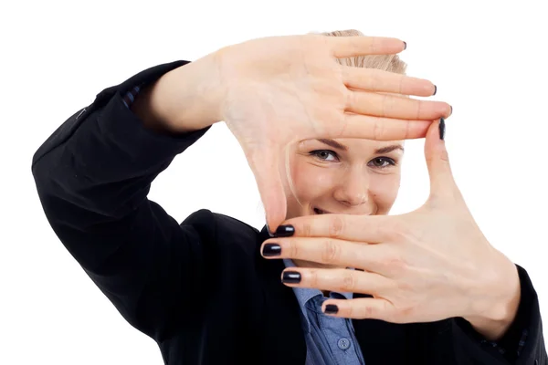Geschäftsfrau bastelt einen Handrahmen — Stockfoto