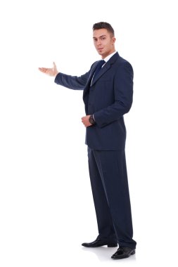 Business man presenting and showing clipart