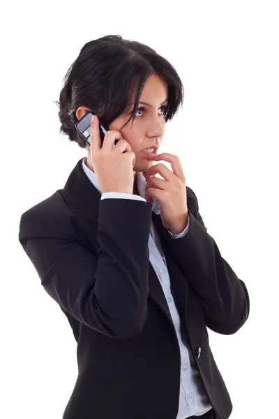 Mulher pensa enquanto fala ao telefone — Fotografia de Stock