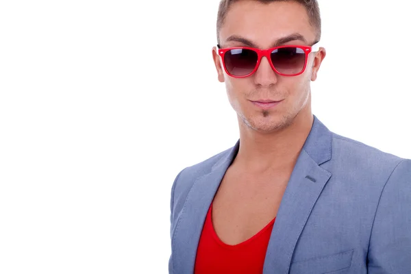 Fashion man wearing red sunglasses — Stock Photo, Image