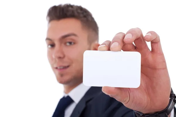 Business man handing a blank business card — Stock Photo, Image