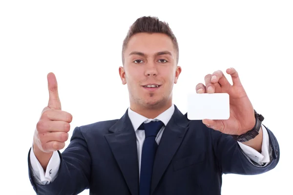 Homem de negócios mostrando um cartão de visita em branco — Fotografia de Stock