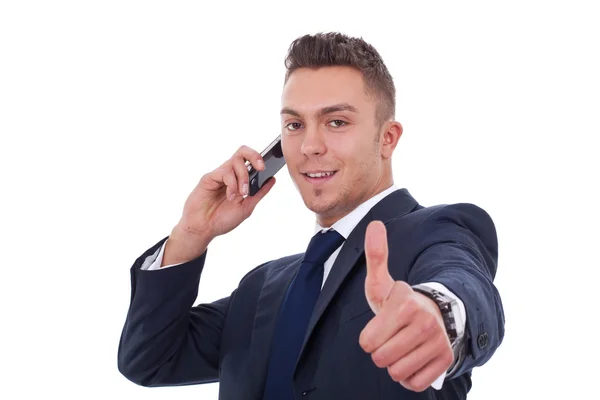 Business man making a thumbs up gesture — Stock Photo, Image