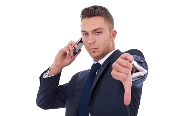 Businessman with bad news on his cell phone — Stock Photo, Image
