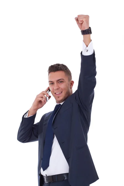 Business man with mobile phone winning — Stock Photo, Image