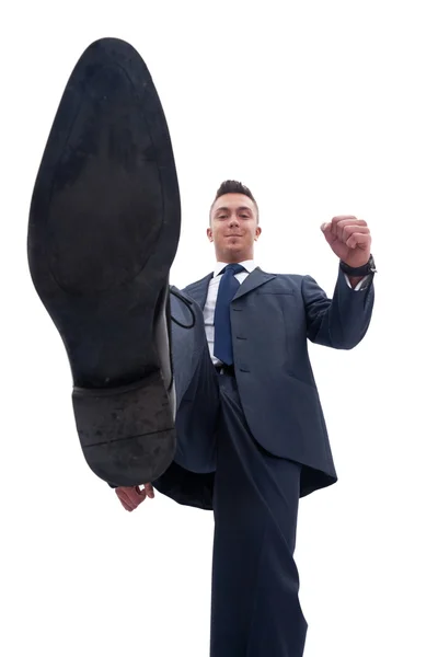 Business man steping on something — Stock Photo, Image