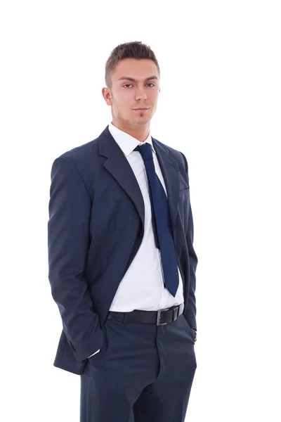 Business man standing with his hands in the pockets — Stock Photo, Image