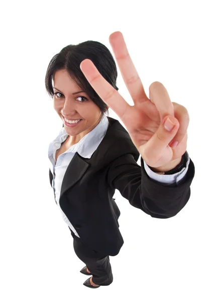 Aantrekkelijke zakenvrouw maken van overwinning teken — Stockfoto