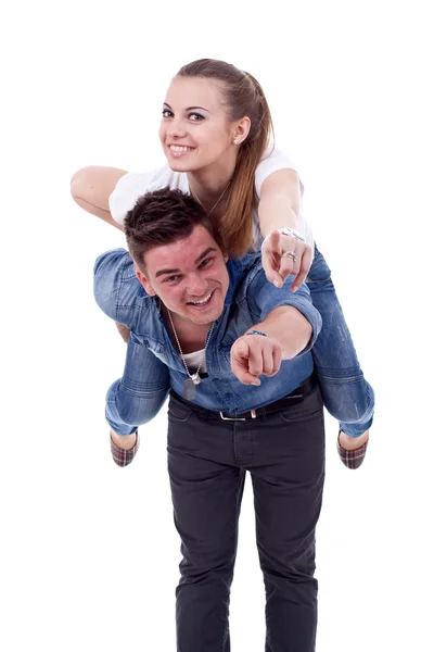 Young man carrying his cute girl on back — Stock Photo, Image