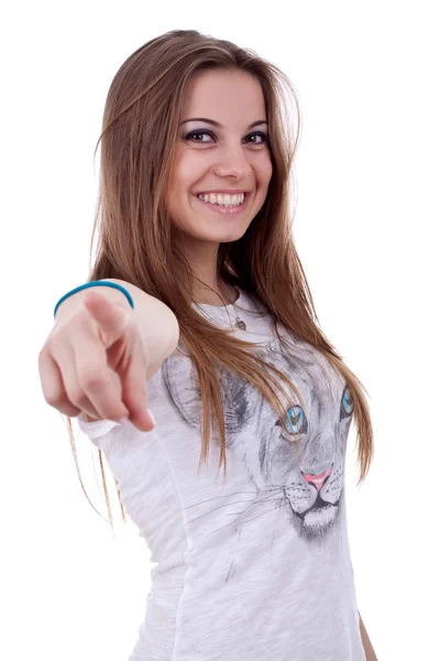 Young smiling woman points — Stock Photo, Image