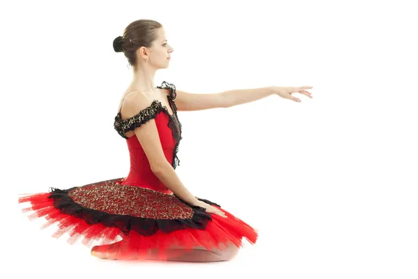 Elegante bailarina clásica con tutú rojo — Foto de Stock