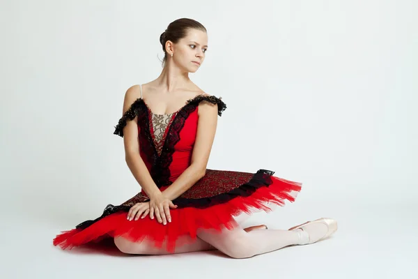 Beautiful ballerina sitting — Stock Photo, Image