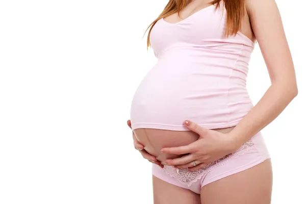 Pregnant woman 's belly — стоковое фото