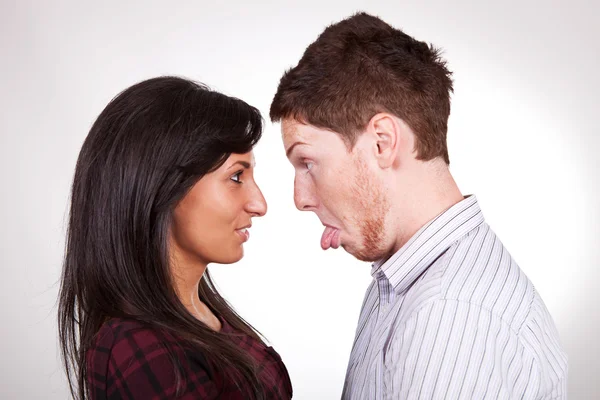 Head to head couple making faces — Stock Photo, Image