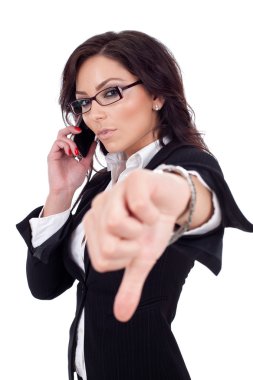 Businesswoman with thumb down gesture