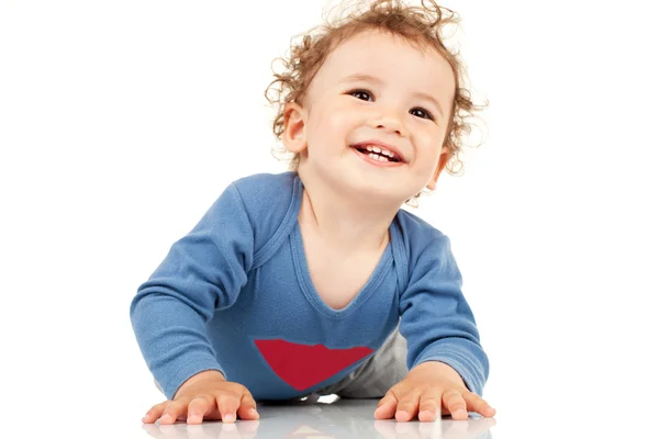 Kid fastställande och leende — Stockfoto