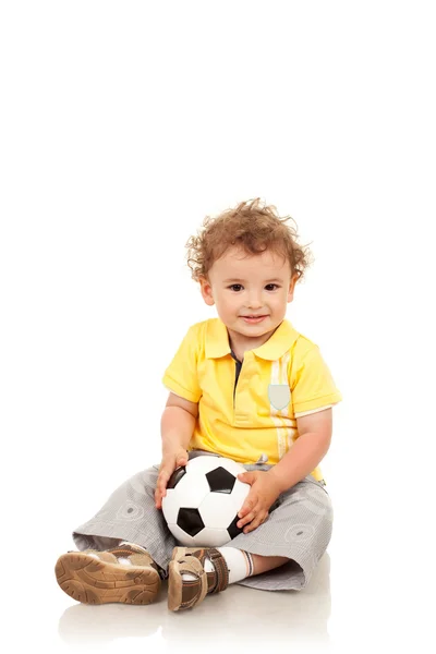 Ragazzo in possesso di una palla da calcio — Foto Stock