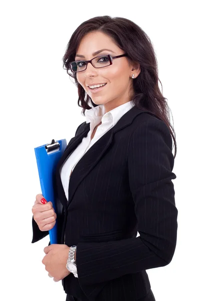 Confident business woman holding a clipboard — Stock Photo, Image