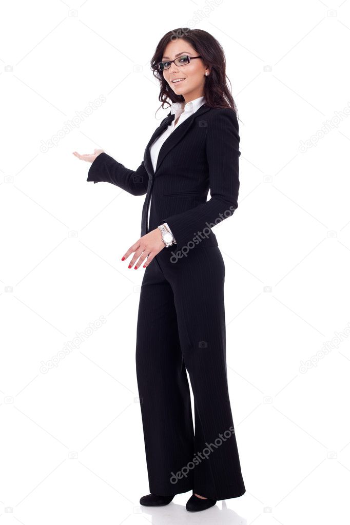 Business woman making a welcoming or presenting gesture