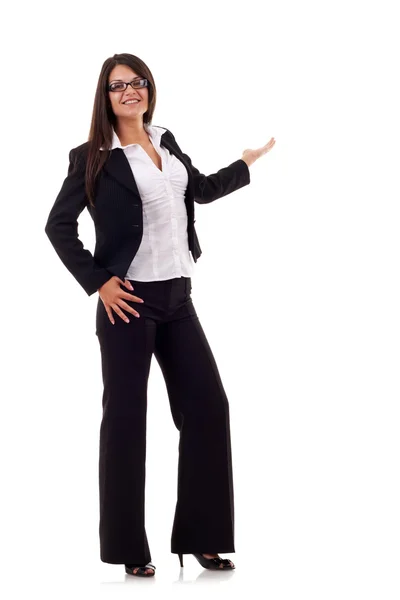 Mujer de negocios señala algo en su espalda — Foto de Stock