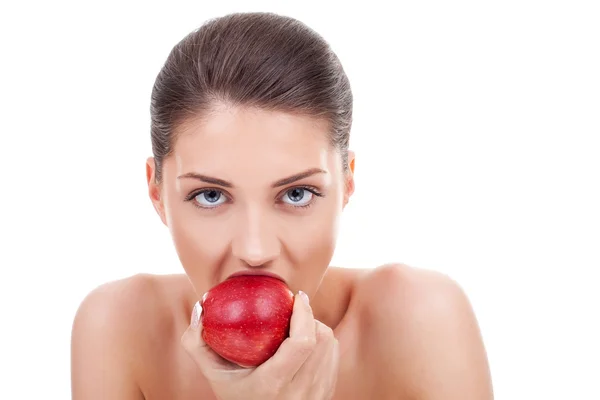 Lei morde la mela rossa — Foto Stock