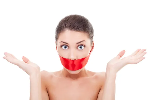 Amazed woman with mouth covered — Stock Photo, Image
