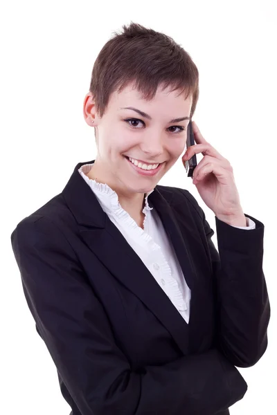 Affärskvinna i telefon Stockfoto