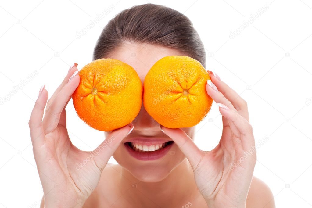 Woman with oranges in her hands