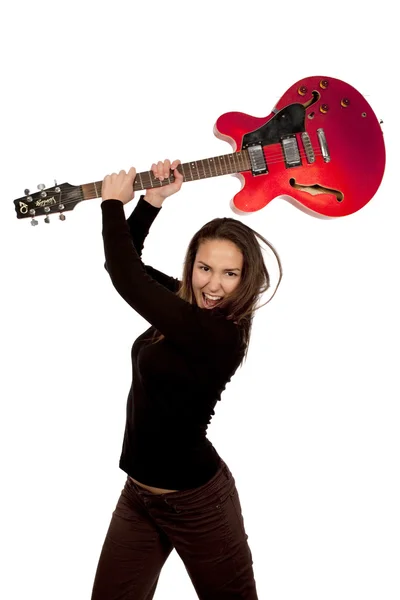 Woman holding red electric guitar — Stock Photo, Image