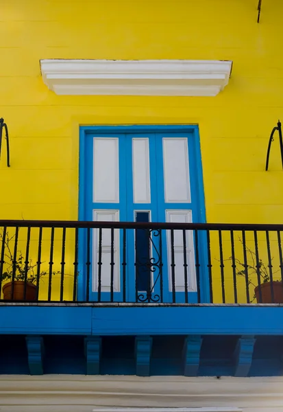 Blue and yellow entrance in cuba Stock Picture