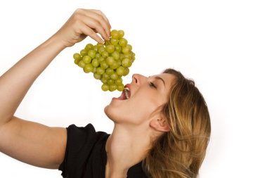 Young woman holding green fruit over white background clipart