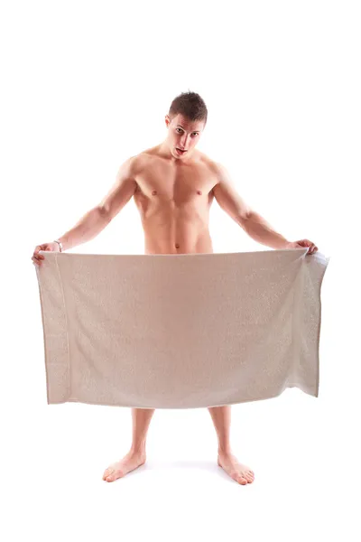 Krásný statný muž s ručníkem. — Stock fotografie