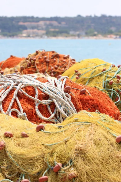 Pile yellow and orange fishing net — Stock Photo, Image